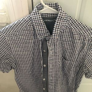 Two mens medium Airwalk shirts.